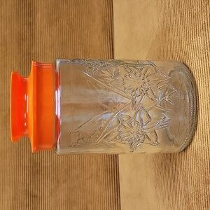 Vintage Anchor Hocking Glass Jar with Orange Lid. Daffodils Pattern